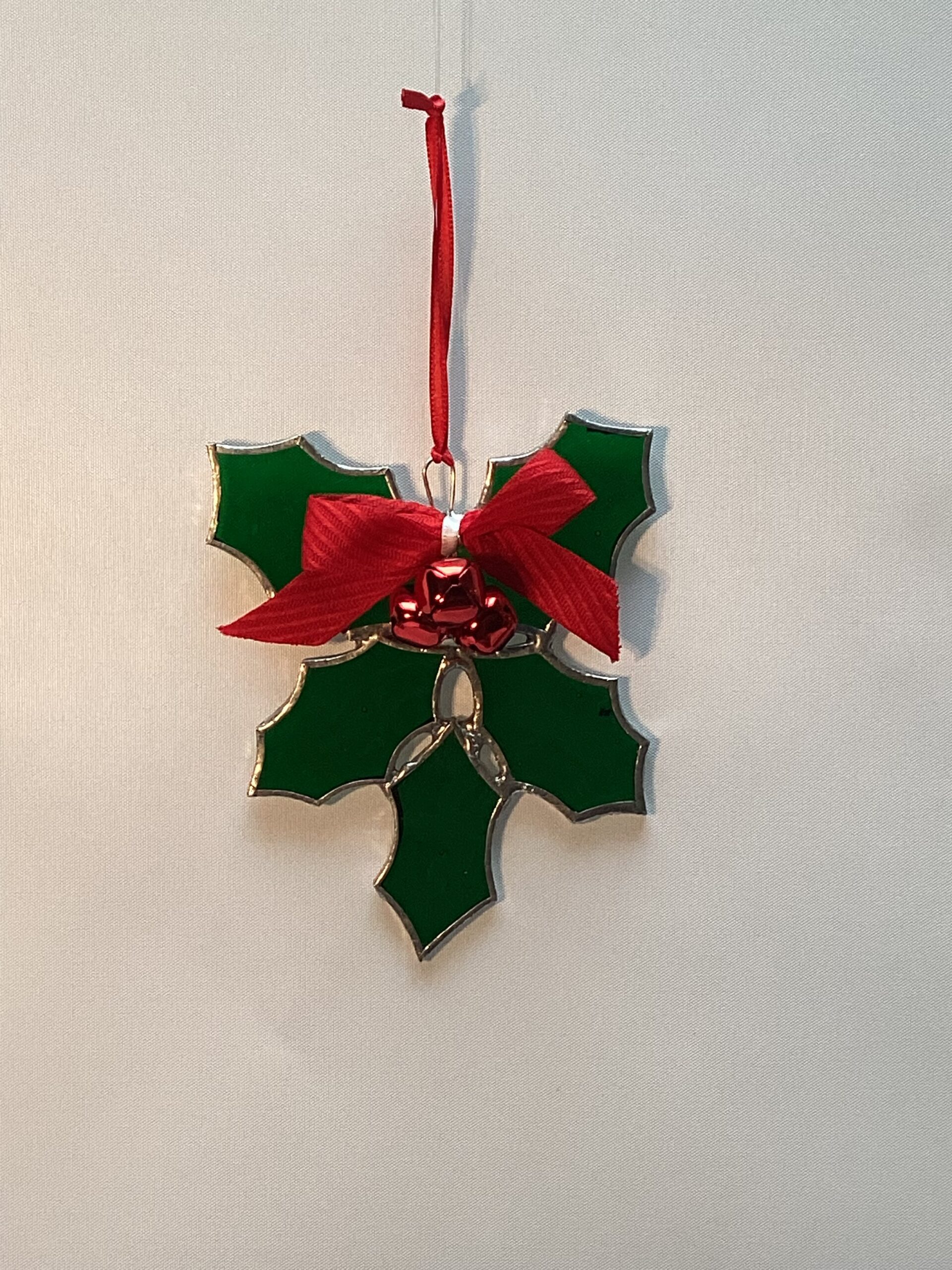 hulst takje met rode belletje