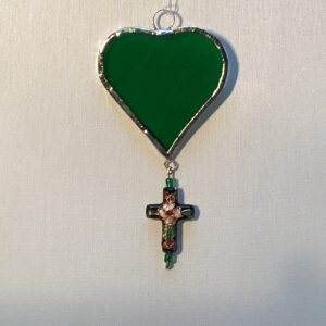 groen hart met zwart kruis