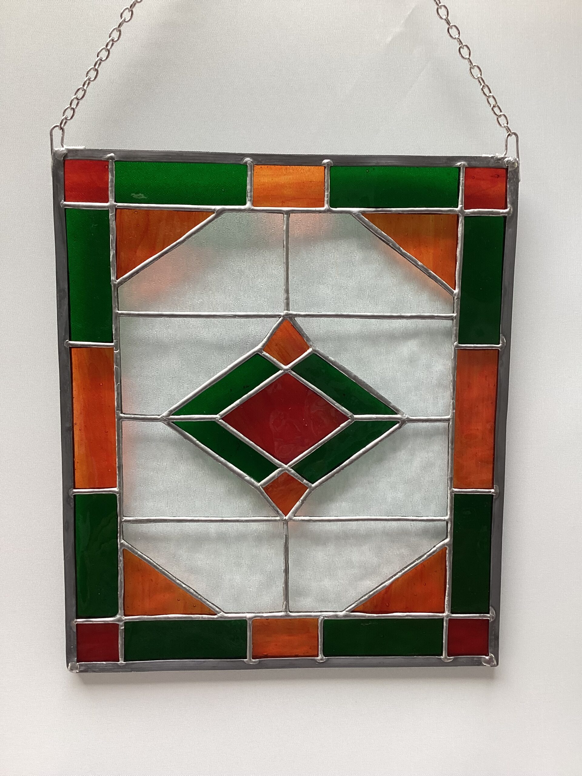 Oranje groene raamhanger