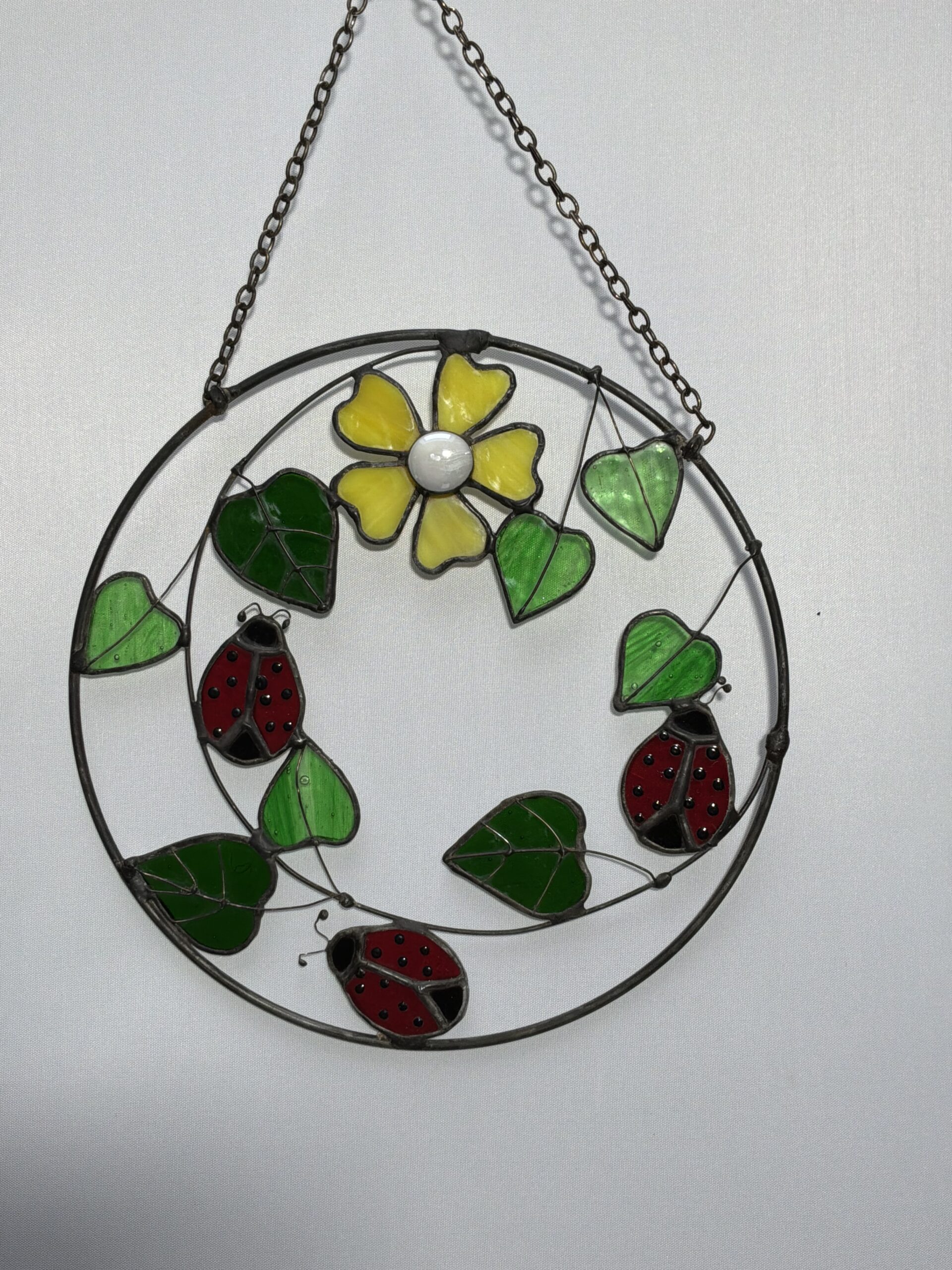 Glasinlood heersbeestje met witte bloem - Afbeelding 2