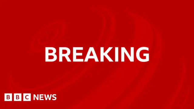 Two people were arrested after a man was found dead at the property