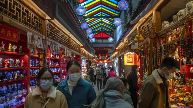 The World Bank report says that debt, trade barriers and uncertainty will drag on Asian economies
