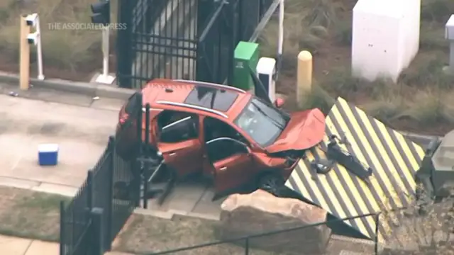 FBI says a driver rammed a vehicle into the front gate of its Atlanta office