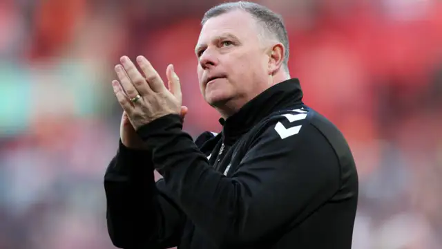 Mark Robins is trying to stop Manchester United in the FA Cup