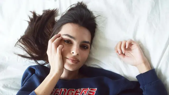 The New York Rangers sweater is being modeled by Emily Ratajkowski