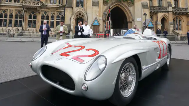 The celebrities and classic cars gathered at the abbey to celebrate the life of Sir Stirling Moss