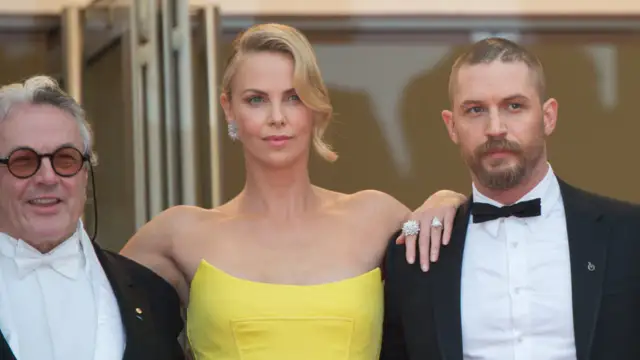 The director of'Mad Max:Fury Road' opens up about the on-set feud between Tom Hardy and Charlize Theron