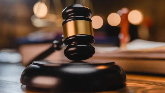 Washington state man found guilty of murder in death of police officer mistakenly shot by deputy