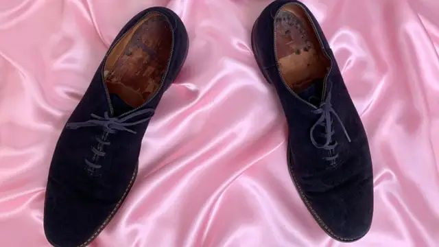 The blue shoes that Elvis Presley wore sell for $150,000 at an auction