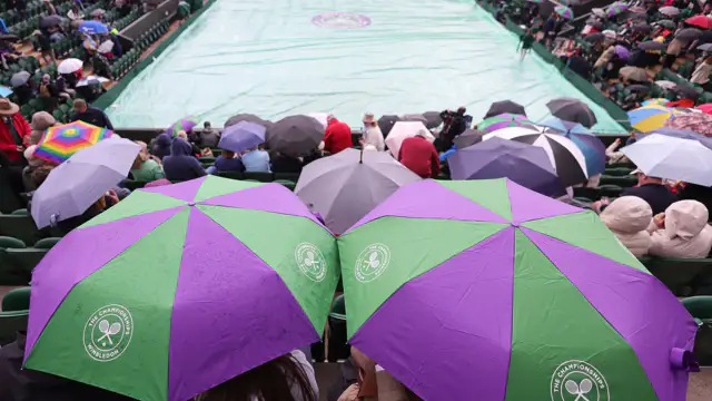 Rain impacts Wimbledon attendance but not England's soccer fans