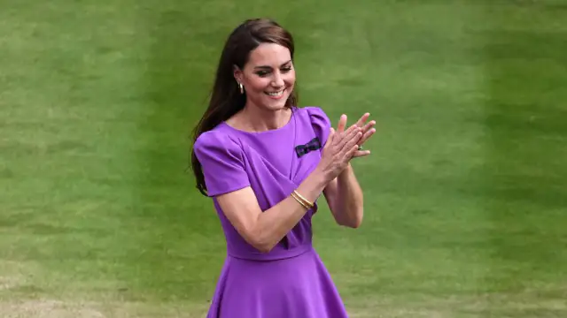 Pink steals the spotlight in a chic white zip-up dress at Wimbledon