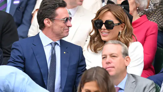 At Wimbledon, Hugh Jackman and Kate Beckinsale chat to each other
