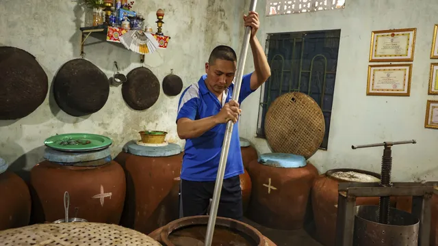 Climate change and overfishing jeopardize Vietnam's iconic fish sauce production