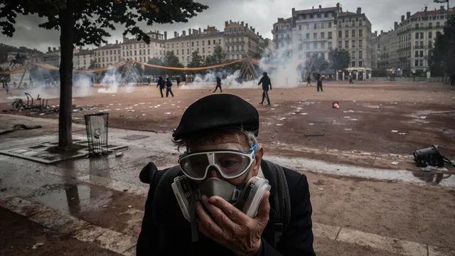 Protesters set fire to a tourism office in Lyon, France, during cost-of-living demonstrations