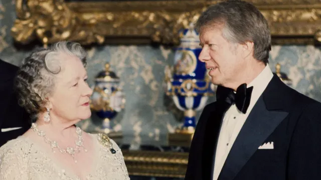Jimmy Carter kisses Queen Mother on the lips and shatters royal protocol