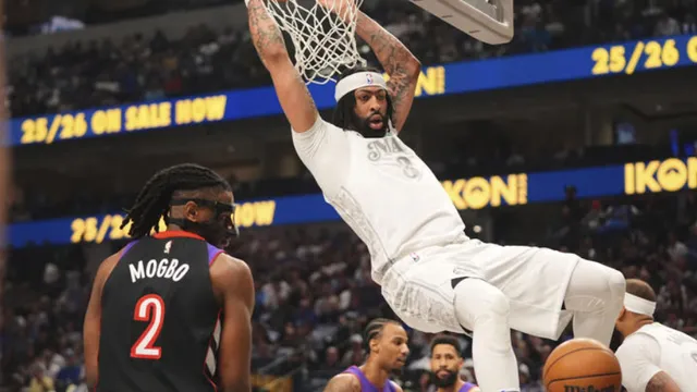 Anthony Davis dominates with a triple-double as Mavericks crush Raptors