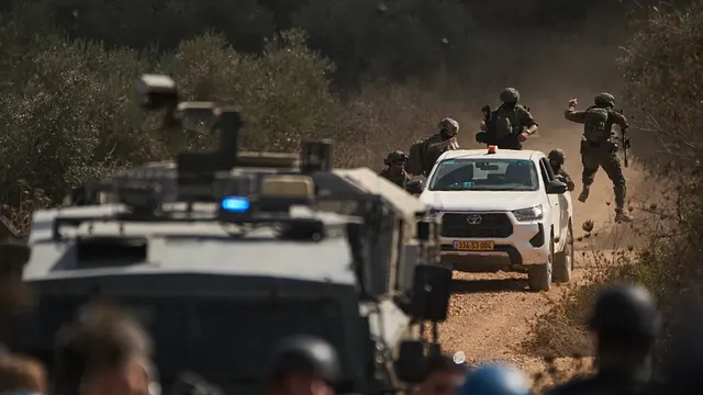 Israel orders West Bank closure after soldiers kill two Palestinians in alleged attack