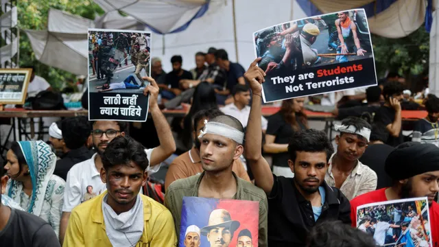 Protesters demand resignation of education minister after police crackdown