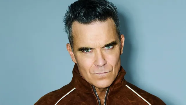 Robbie Williams surprises fans by releasing new album early