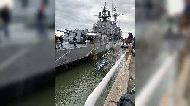 Thirty people stranded as walkway collapses on WWII destroyer