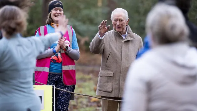 King Charles III surprises joggers at cancer charity parkrun
