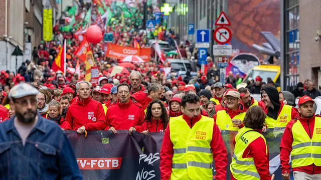 Belgian police and protesters clash in Brussels during anti-austerity strike