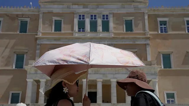 Tourists in Greece embrace sun protection with hats and sunscreen