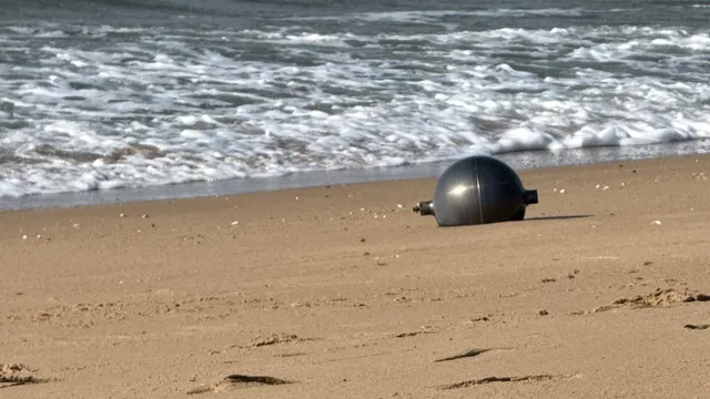 Harmless space debris identified as mysterious silver spheres on Australian beach