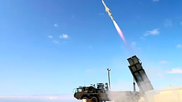 China warns Japan against relaxing weapons export restrictions