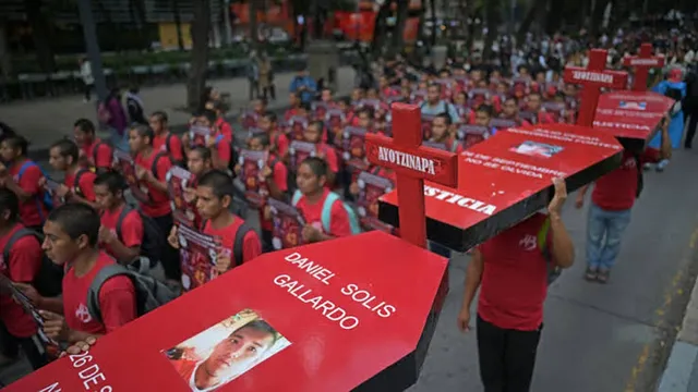 Thousands protest in Mexico City demanding answers on 43 missing teacher trainees