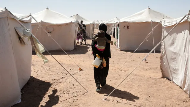 U.N. official negotiates aid access for famine-stricken Sudanese city