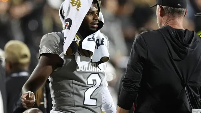 Colorado makes bowl eligibility with Hunter and Sanders' strong play