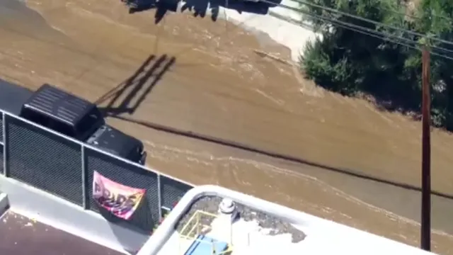 Water main break floods Hollywood Hills road and disrupts local community