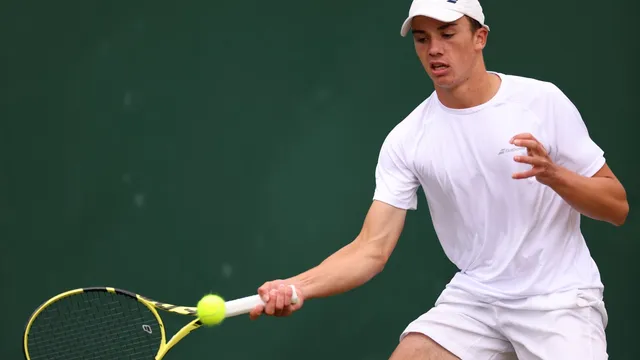 Oliver Tarvet wins first match at Wimbledon despite prize money controversy