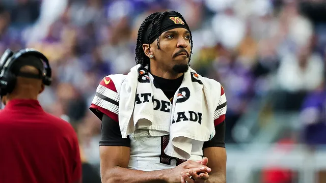 Lamar Jackson sidelined with back injury against Patriots