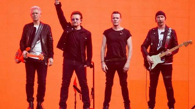 U2 returns to Dublin school where band formed 50 years ago for surprise concert