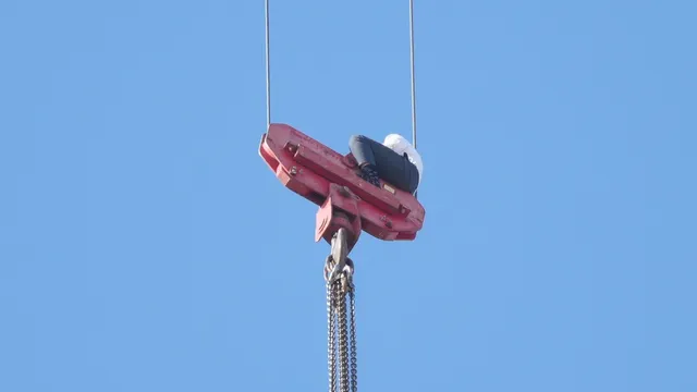 Teen rescued after dangling from crane in Jerusalem for hours