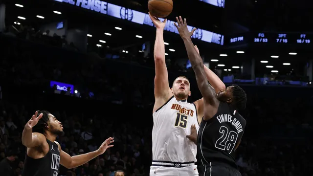 Jokic shines with 29 points, Nuggets edge Nets in overtime