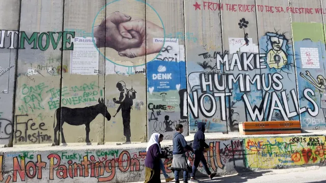 Banksy Launches Smile Campaign with New Murals in North London