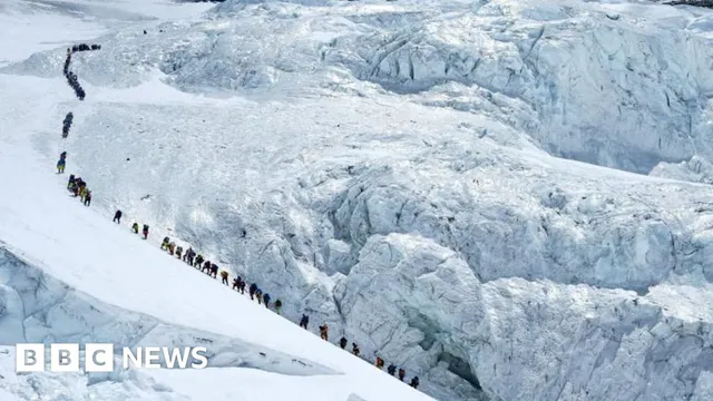 Record 274 climbers reach summit of Everest in one day