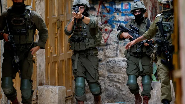 Israeli settlers rampage in West Bank, torch mosques and detain Palestinians