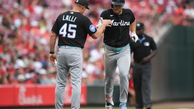 Marlins rally with four-run eighth to beat Reds 8-4
