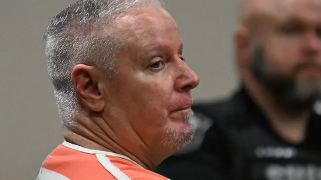 Father sentenced to 15 years for providing gun to son who killed four at school