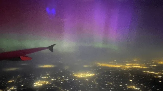 Man captures stunning northern lights view from plane window