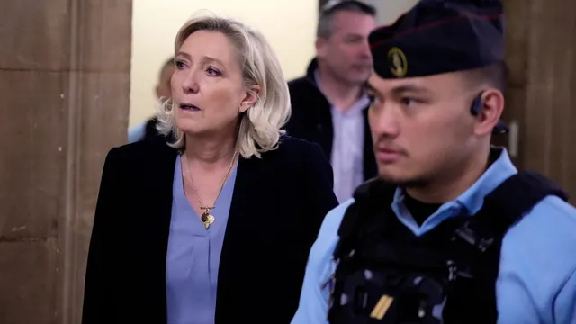Marine Le Pen admits mistake in EU funds trial as political future hangs in the balance
