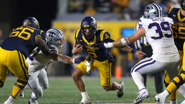 West Virginia coach faces pressure as team seeks victory