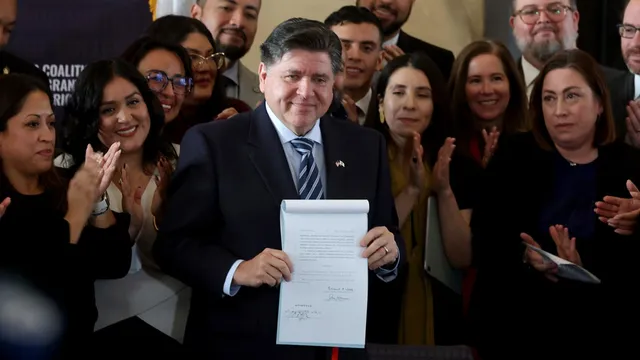 Illinois governor signs law to protect immigrants from federal enforcement