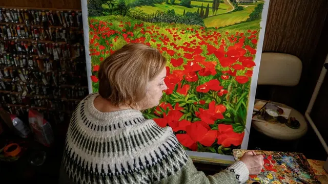 Ukraine's artist confronts the Olympics with banned helmet honoring war dead