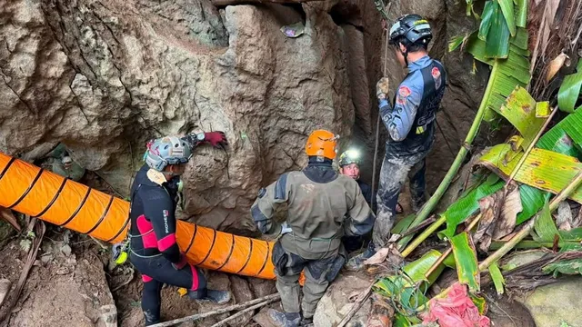 Heavy rains hinder search for missing miners in Laos cave