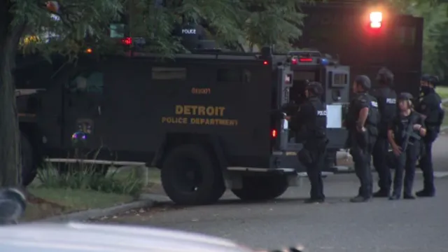 Woman points gun at children in Detroit neighborhood